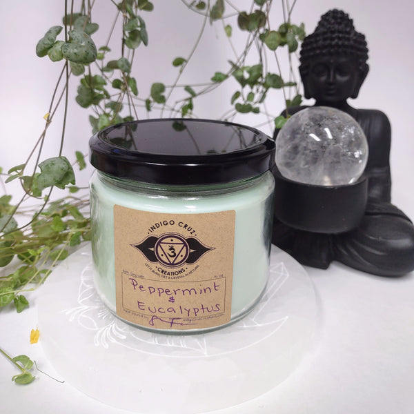 Peppermint and Eucalyptus 10 oz Soy wax candle with a crystal at the bottom